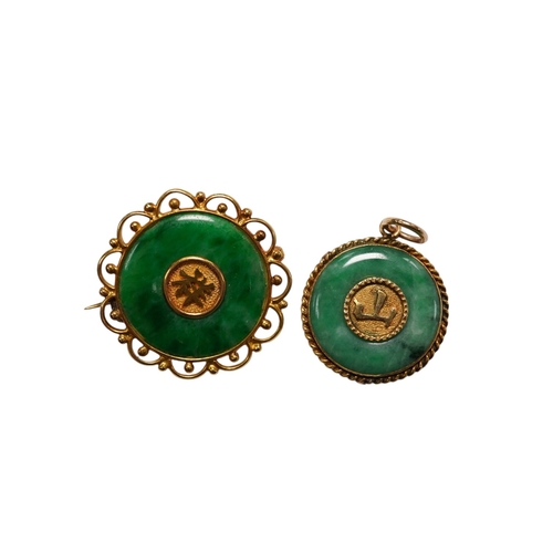 938 - A Chinese 18k and jade set circular brooch, 23mm and a similar yellow metal and jade set pendant, gr... 