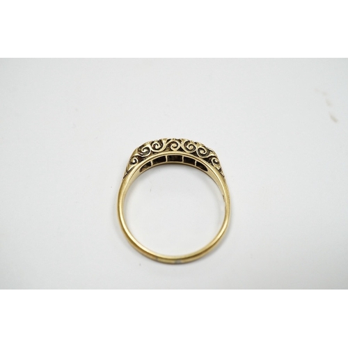 939 - A yellow metal and graduated five stone diamond set half hoop ring, size O, gross weight 3.1 grams. ... 