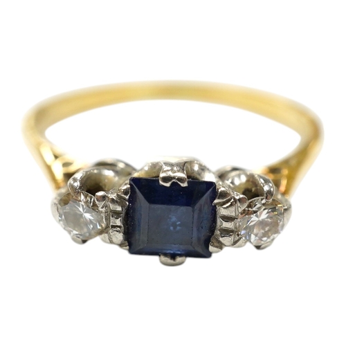 947 - A yellow metal, sapphire and diamond set three stone ring, size Q, gross weight 3 grams. Condition -... 