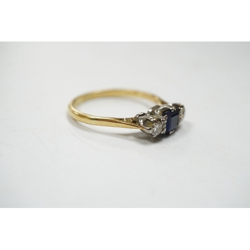 947 - A yellow metal, sapphire and diamond set three stone ring, size Q, gross weight 3 grams. Condition -... 