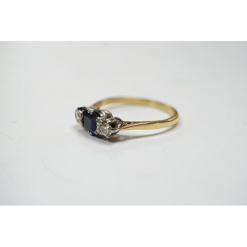 947 - A yellow metal, sapphire and diamond set three stone ring, size Q, gross weight 3 grams. Condition -... 