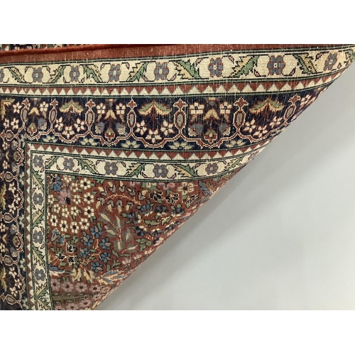 1022 - A Persian russet ground rug, 160 x 93cm. Condition - light wear to fringes, otherwise good