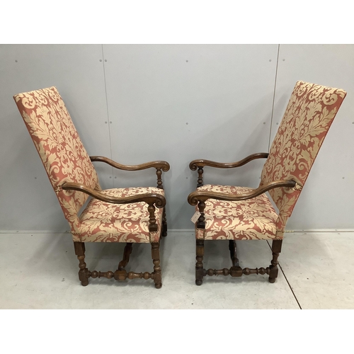 1023 - A pair of Louis XIV style walnut open armchairs, width 66cm, height 121cm. Condition - light rubbing... 