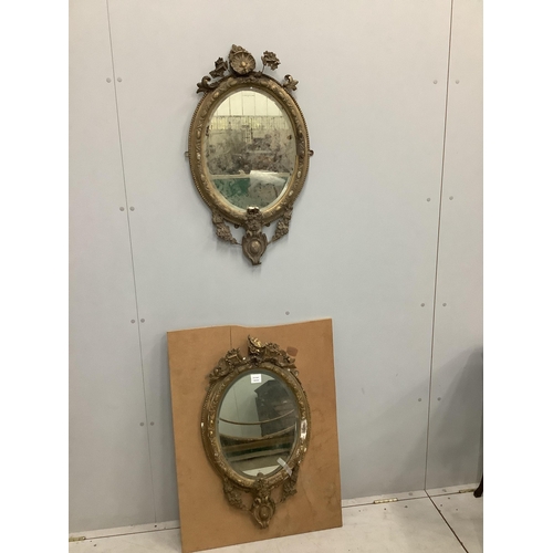 1024 - A pair of Victorian oval giltwood and gesso wall mirrors, in need of restoration, width 45cm, height... 