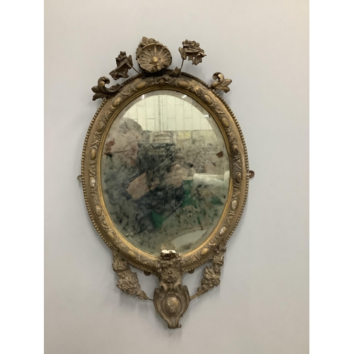 1024 - A pair of Victorian oval giltwood and gesso wall mirrors, in need of restoration, width 45cm, height... 