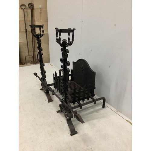 1026 - A French wrought iron fire basket with dogs and cast fire back, width 127cm, depth 53cm, height 88cm... 