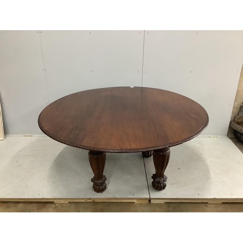 1028 - An Indian padouk wood circular top dining table, diameter 152cm, height 74cm. Condition - table has ... 