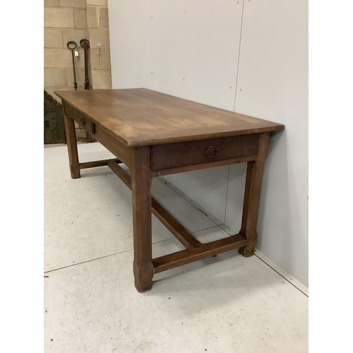 1043 - A rectangular French cherry kitchen table, width 179cm, depth 79cm, height 76cm. Condition - fair to... 