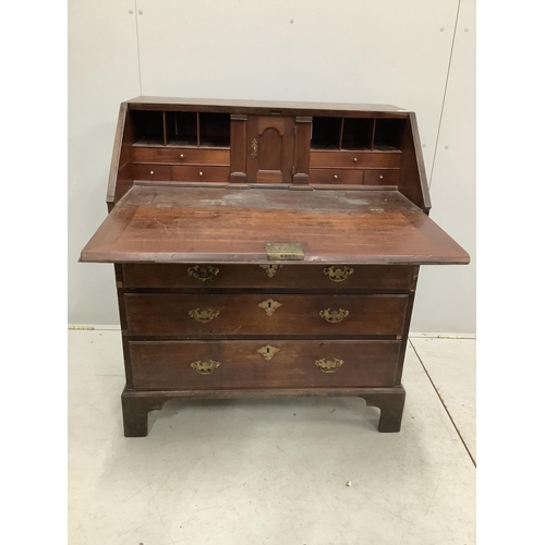 1053 - A George III mahogany bureau, width 96cm, depth 56cm, height 106cm. Condition - poor to fair, top wi... 