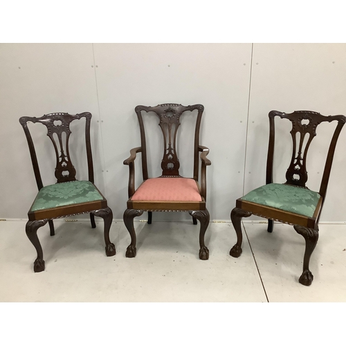 1058 - A set of three Chippendale style mahogany dining chairs, one with arms. Condition - fair