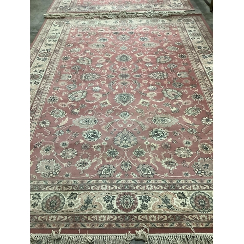 1064 - A Kashan style peach ground machined carpet, 360 x 274cm. Condition - fair to good, will require cle... 