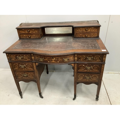 1068 - An Edwardian marquetry inlaid rosewood bowfront kneehole desk in the manner of Edwards and Roberts, ... 