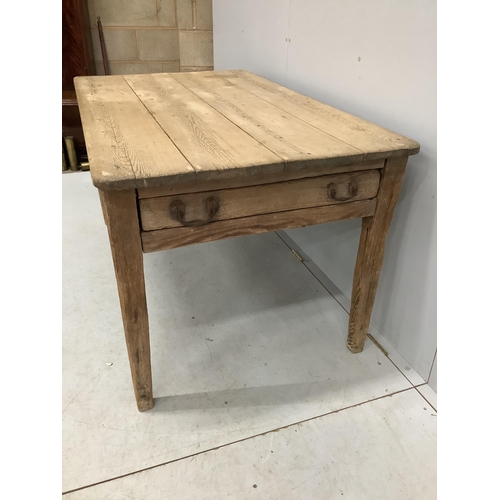 1073 - A 19th century rectangular scrubbed pine kitchen table fitted drawer on square tapered legs, width 1... 