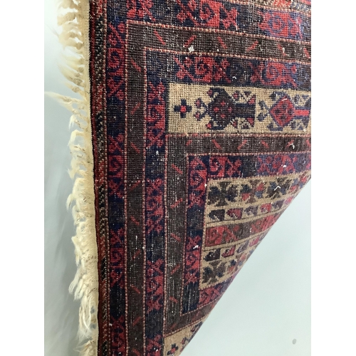 1081 - A Belouch fawn ground prayer rug, 152cm x 86cm. Condition  - fair, areas of low pile