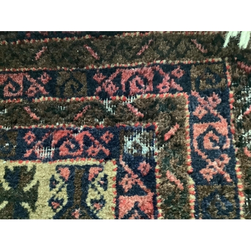 1081 - A Belouch fawn ground prayer rug, 152cm x 86cm. Condition  - fair, areas of low pile