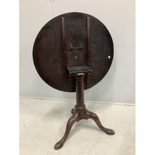 1085 - A George III circular mahogany tilt top tea table, diameter 81cm, height 71cm. Condition - fair to g... 