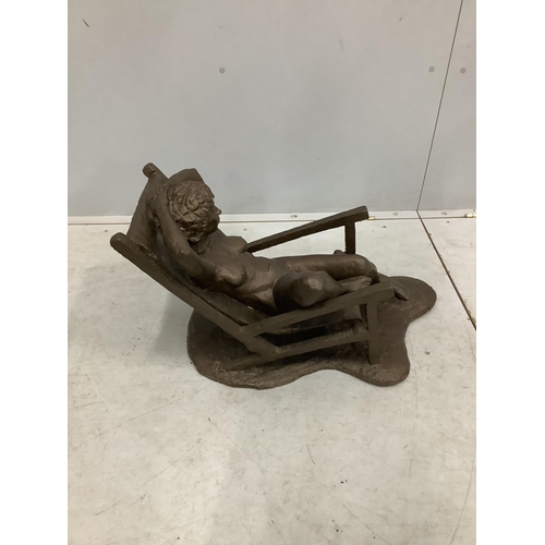 1086 - Norman Barrow (Modern British) a bronzed composition sculpture, female nude reclining in a chair, he... 