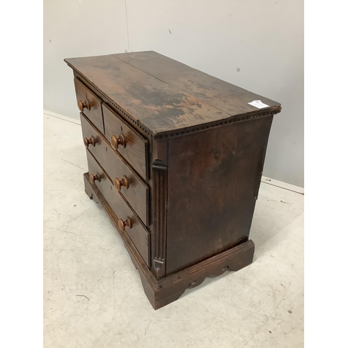 1107 - An 18th century miniature oak chest of two short and two long drawers, possibly childs furniture, w... 