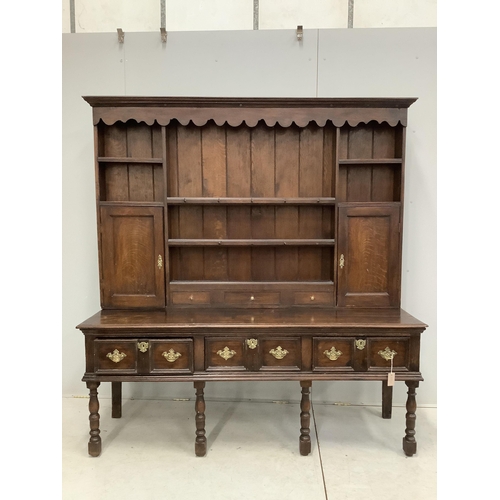 1116 - An 18th century style oak dresser with boarded rack, width 178cm, depth 52cm, height 190cm. Conditio... 