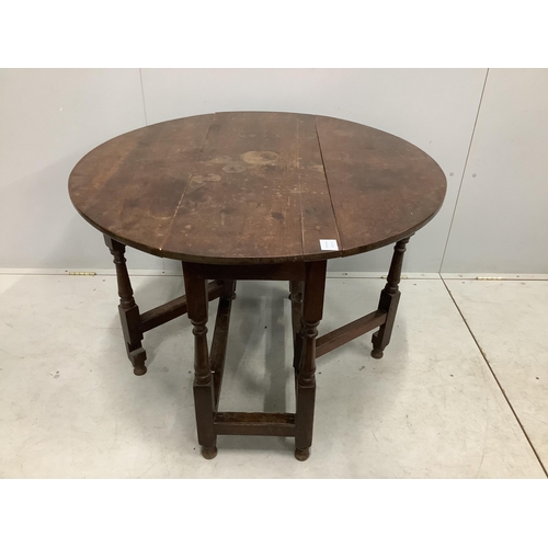 1146 - A small 18th century oak gate leg table, width 99cm, depth 38cm, height 72cm. Condition - fair... 