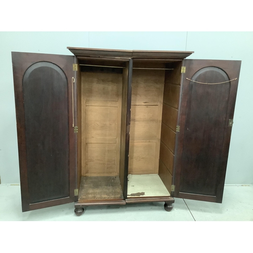 1155 - A Victorian mahogany two door hanging wardrobe, adapted, width 119cm, depth 67cm, height 175cm. Cond... 