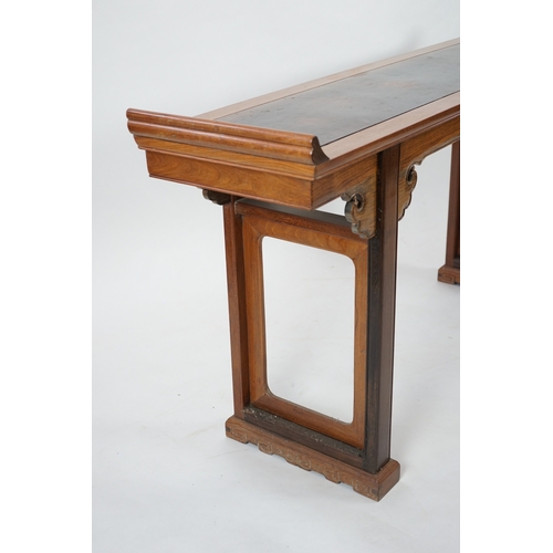 1167 - A Chinese padouk wood and jichimu altar table, the panelled rectangular top with scroll ends, on pla... 