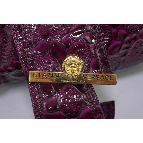 1255 - A purple patent Versace large handbag, with dust bag