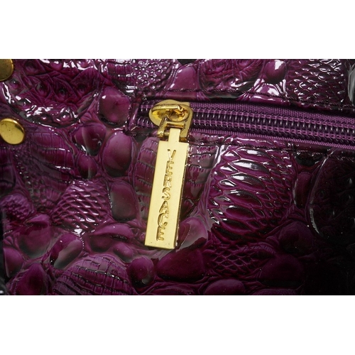 1255 - A purple patent Versace large handbag, with dust bag