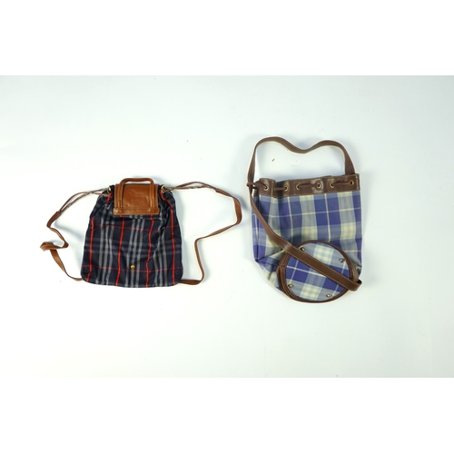 1256A - Two tartan canvas with leather trim Burberry bags, one backpack and one bucket bag