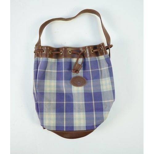 1256A - Two tartan canvas with leather trim Burberry bags, one backpack and one bucket bag