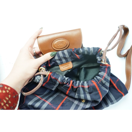 1256A - Two tartan canvas with leather trim Burberry bags, one backpack and one bucket bag