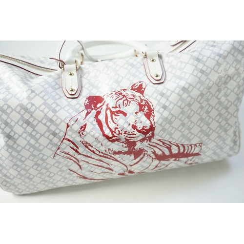 1258 - A large white monogram Bally weekend bag 'Berlinda' with red tiger detail, red lining, additional ke... 