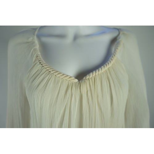 1263 - A Diane von Furstenberg cream silk lady's blouse with rope detail, a Dusk for Frank Usher cream silk... 