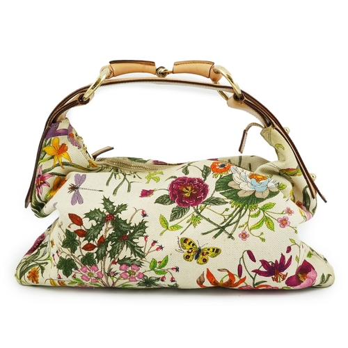 1279 - A Gucci flora canvas horse-bit hobo bag with dust bag