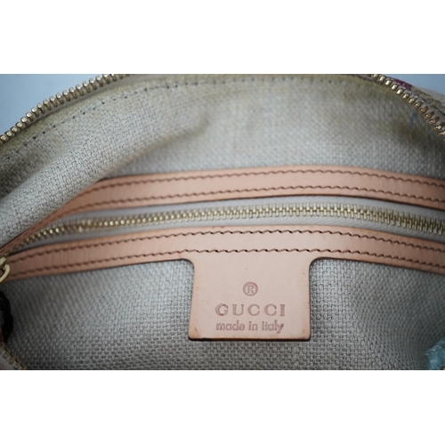 1279 - A Gucci flora canvas horse-bit hobo bag with dust bag