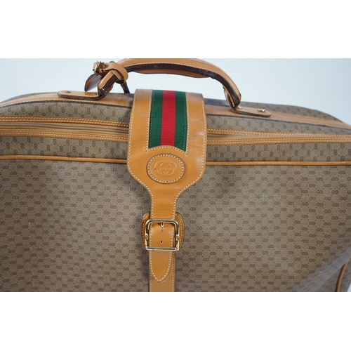 1280 - A vintage Gucci micro GG monogram canvas suitcase