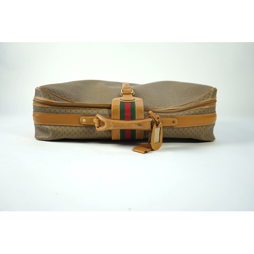 1280 - A vintage Gucci micro GG monogram canvas suitcase