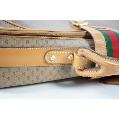 1280 - A vintage Gucci micro GG monogram canvas suitcase