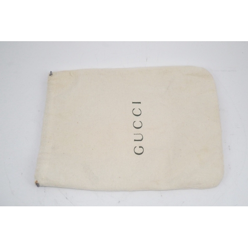 1283 - Three vintage Gucci handbags, two canvas blue GG monogram and the other black leather