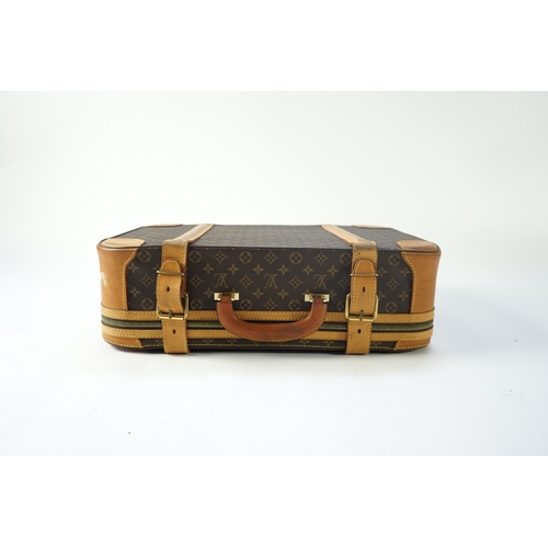 1285 - A Louis Vuitton monogrammed canvas with leather trim soft sided suitcase