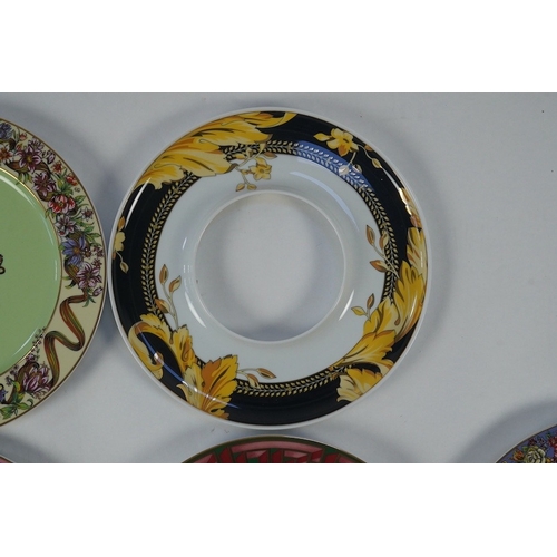 1292 - Five boxed Rosenthal for Versace transfer decorated plates, 31cm diameter, and a boxed serving dish,... 