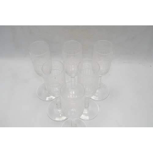 1298 - Six boxed Rosenthal for Versace champagne flutes with etched Greek key decoration, 18.5cm high. Cond... 