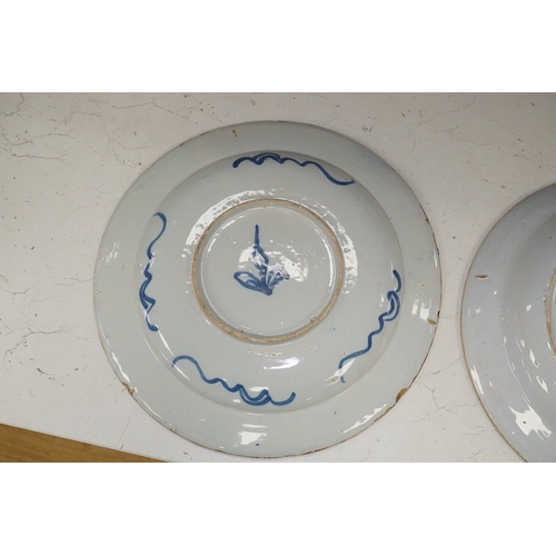 1312 - Three 18th century Delft pottery dishes, largest 31cm diameter. Condition - poor to fair