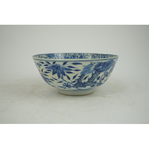 1321 - A Chinese blue and white footed bowl, 19th century, the interior decorated with a bird and flowers, ... 