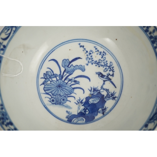 1321 - A Chinese blue and white footed bowl, 19th century, the interior decorated with a bird and flowers, ... 