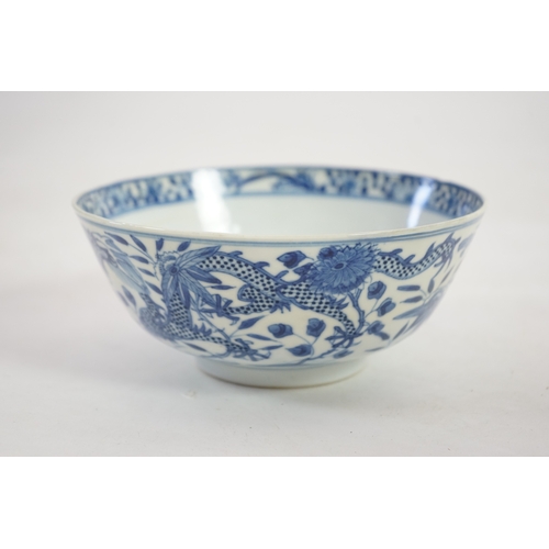 1321 - A Chinese blue and white footed bowl, 19th century, the interior decorated with a bird and flowers, ... 