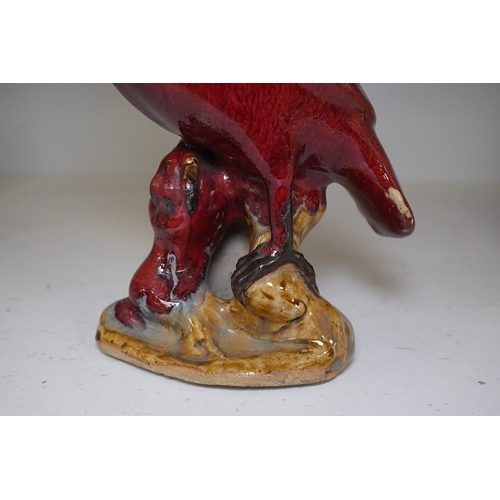 1325 - A Chinese flambé glazed figure of a bird, 20.5cm high. Condition - fair to good.