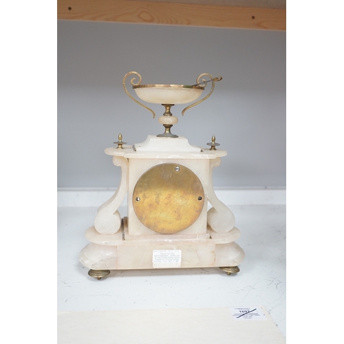 1329 - A Victorian alabaster mantel clock, striking on a bell, height 27cm. Condition - fair.