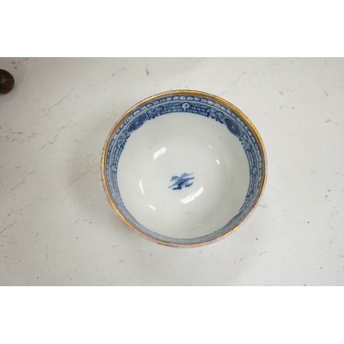 1338 - A Chinese blue and white plate, a tea bowl, two pottery bowls and a wooden stand (5). Condition - fa... 