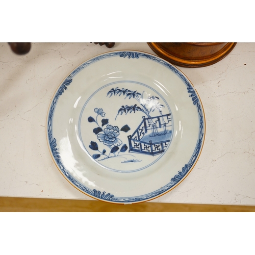 1338 - A Chinese blue and white plate, a tea bowl, two pottery bowls and a wooden stand (5). Condition - fa... 